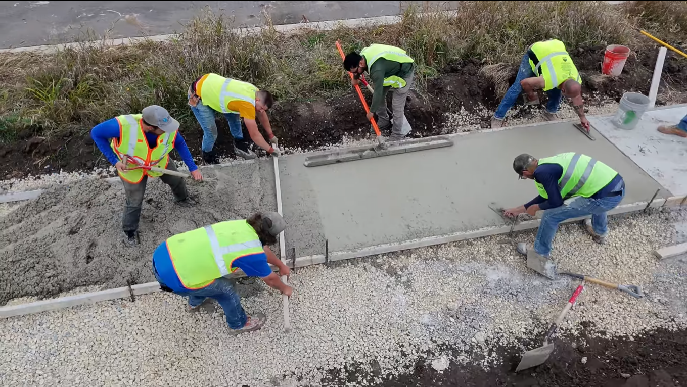 ADA compliant concrete sidewalk and curb ramp installation